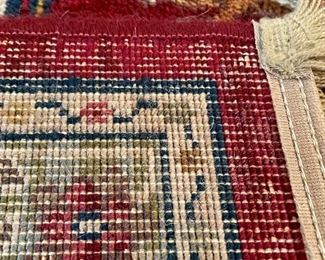 close up of the knotting of Emperor’s Hunt rug