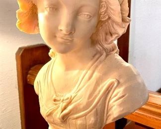 $100; reproduction of French peasant girl by Grinham Niam; very heavy; 11”w x 9”d x 18”h