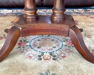 detail of pedestal legs on coffee table
