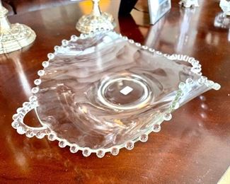 $14; unique curved serving dish