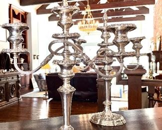 $200; pair of silver-plated, three-piece candelabras; 14”w x 4”d 20”h