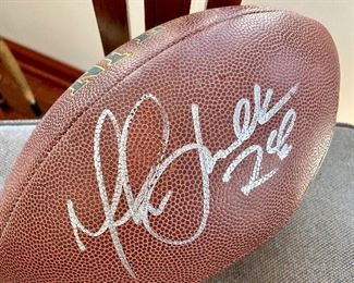 $150; Marshall Faulk signed football