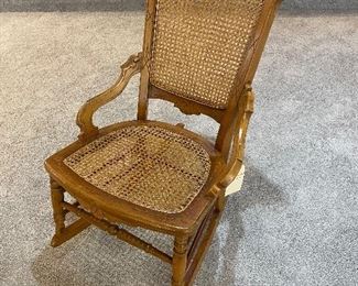 $200; vintage oak rocker with new caning; very sturdy; 22”w x 17”d (seat) x 36”high