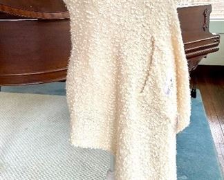 $30; “Giving shawl” that is very soft and has pockets on both sides