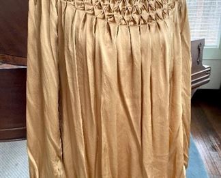 $24; gold, silk blouse with ruffled yoke and elastic cuffs by Sundance; size XL