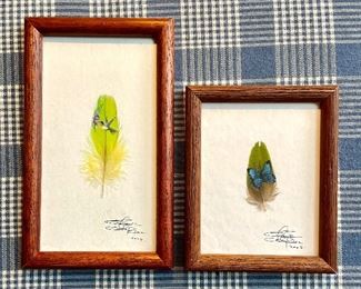 Delicate painting on feather, framed with glass front. $40/each