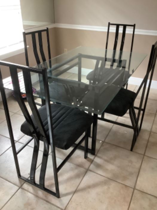 4 iron chairs glass top 99.