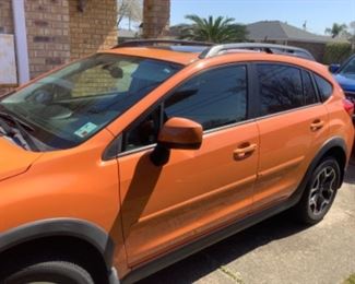 2013.  Bit over 60k miles. 15,000 Subaru