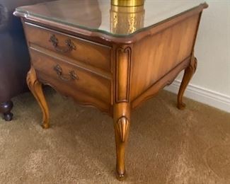 Two end tables with glass tops