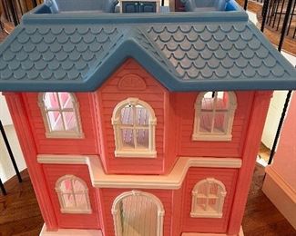 Toddler size doll house. Comes with play furniture