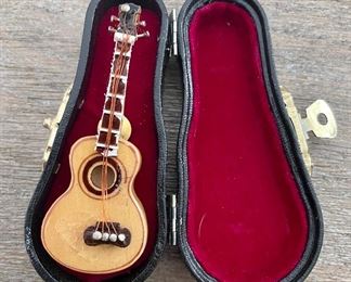 Tiny guitar in case - 2.5" or so