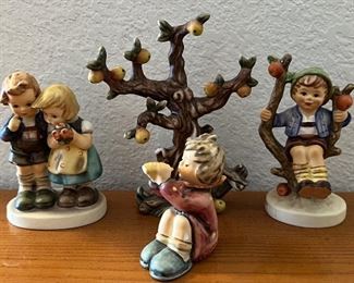 (4) Assorted Goebel Figurines - We Congratulate, Apple Tree Boy, Tree, And More (As Is)
