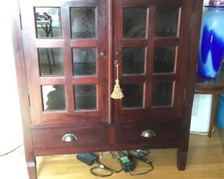 Cabinet with 2 drawers and 3 interior shelves. (43.5in H x 39.25in W x 15in D)