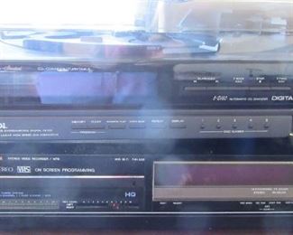 Top:  Multiple CD player. Bottom: VHS player.