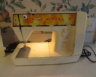 Working Singer portable Genie sewing machine.