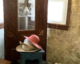 One of three oak doors w/etched glass, small pine chest, two mini green stools, hats etc.