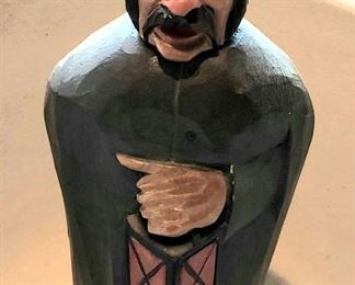 11" carved wood figurine