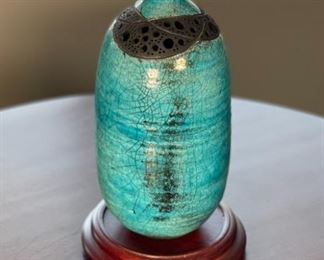 Signed Raku Studio pottery with Japanese Stand	8.75 inches high	
