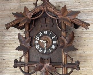 Antique Black Forest Cuckoo Clock 2 Door  Hand Carved	23 x 25 x 8in	HxWxD
