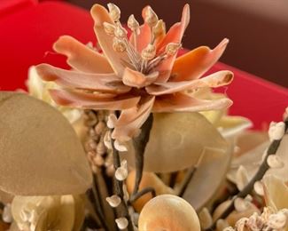 Folk Art Seashell Flower Motif Bouquet in a Stone Vessel	10 x 24 x 16in	HxWxD
