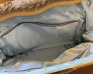 Oscar de la Renta studio purse white	8.25 inches long       6. 25 inches tall	

