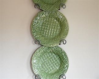 wall hanger for plates and three green majolica style plates