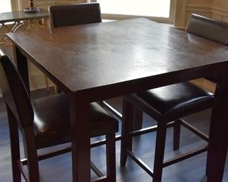 bar-height walnut  table with three (3) chairs 
