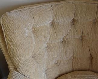 upholstered, tufted club chair (detail)