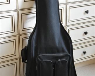 Takamine G-Series electric acoustic guitar and Guardian Cases travel case. Some of the celebrities who play a Takamine guitar include Jon Bon Jovi, Garth Brooks, and Bruce Springsteen!