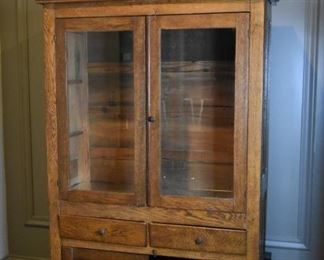 Rustic, oak glass front cabinet
