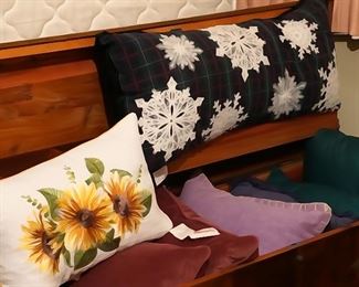 Multiple decorative pillows. 2 cedar chests (Aroma) stamped available as well.