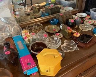 Ashtrays, candle holders, lighters.