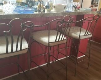 Three iron bar stools