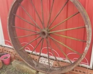 One of two iron wagon wheels