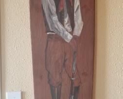 Rustic cowboy painting.