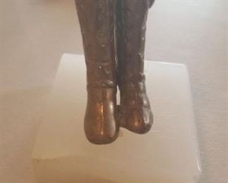 Tiny pair of brass boots