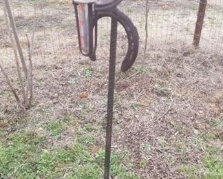 A cowboy rain gauge. Complete with bandana