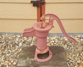Great piece of yard art. Vintage water pump 