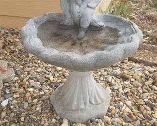 Small concrete birc bath