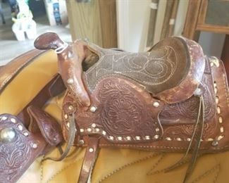 Cute as it can be.  A dog saddle. A must see!