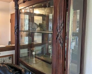 Curio cabinett with beveled glass, $280