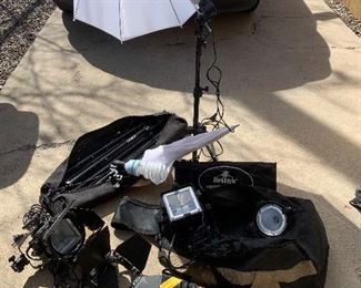 Britek front lighting and backdrop stand/pole, and carrying bags, plus 3 way pro light box set with stands and  barn doors. 