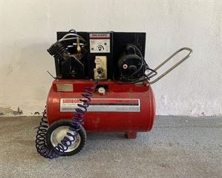 Sanborn air compressor with impact wrench