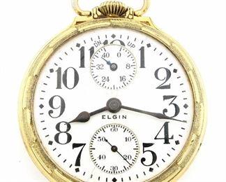 An Elgin "B. W. Raymond" Model Railroad watch with UP/DOWN wind indicator.  16 size, 19 j, Adj Temp & 5 pos, DR, DMK, GJS, SW, LS, GF, OF, Porcelain DSD with Arabic numerals marked "Elgin".  Serial #20145031.  Some wear, dial hairlines, winds, sets and running when cataloged.  ESTIMATE $400-600