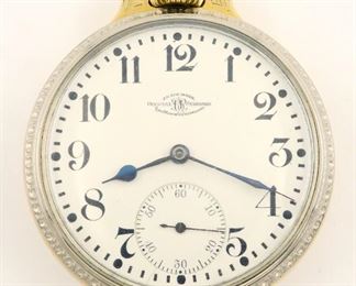 A Ball/Waltham "Official Railroad Standard" Model Railroad watch.  16 size, 19 j, Adj Temp & 6 pos, DR, DMK, SW, LS, BOC, Two Tone OF, Porcelain SSD with Arabic numerals marked "Ball, Official RR Standard...".  Serial #B257331.  Minor wear, winds, and running momentarily when cataloged.  ESTIMATE $200-300