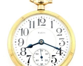 An Elgin "Father Time" Model Railroad watch.  16 size, 21 j, Adj Temp & 5 pos, DR, DMK, SW, LS, Dueber GF case with Masonic Crest on rear cover, OF, Porcelain DSD with Arabic numerals marked "Elgin".  Serial #21686205.  Some wear, winds, sets and running momentarily when cataloged.  ESTIMATE $200-300