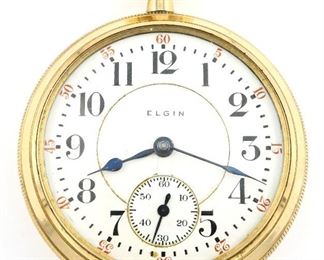 An Elgin "Father Time" Model Railroad watch.  18 size, 21 j, Adj 5 pos, DR, DMK, GJS, SW, LS, GF, OF, Porcelain DSD with Arabic numerals marked "Elgin".  Serial #14409384.  Case wear, hairline in dial, winds, sets and running when cataloged.  ESTIMATE $200-300