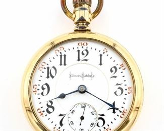 An Illinois "Bunn Special" Model Railroad watch.  18 size, 21 j,  Swing Out movement, Adj Temp & 6 pos, DMK, GJS, SW, LS, CWC Co. GF, OF, Porcelain DSD with Arabic numerals marked "Illinois Watch Co.".  Serial #1785944.  Some wear, dial hairlines, chip at 11:00, winds, sets and running when cataloged.  ESTIMATE $200-300