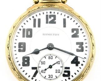 A Hamilton 950B Model Railroad watch.  16 size, 23 j, Adj Temp & 6 pos, DR, DMK, SW, LS, Hamilton GF, OF, Porcelain DSD with Arabic numerals marked "Hamilton".  Serial #S22357.  Minor wear, winds, sets and running when cataloged.  ESTIMATE $800-1,200