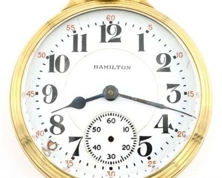 A Hamilton 992B Model Railroad watch.  16 size, 21 j, Adj Temp & 6 pos, DMK, SW, LS, Wadsworth BOC GF, OF, Porcelain DSD with Arabic numerals marked "Hamilton".  Serial #C26360.  Minor wear, dial hairlines and chip at 8:00, lacks seconds bit, winds, sets and running when cataloged.  ESTIMATE $100-150